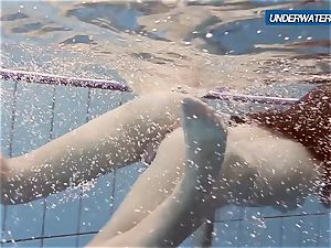 unexperienced Lastova proceeds her swim