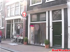 Amsterdam prostitute sucks customer